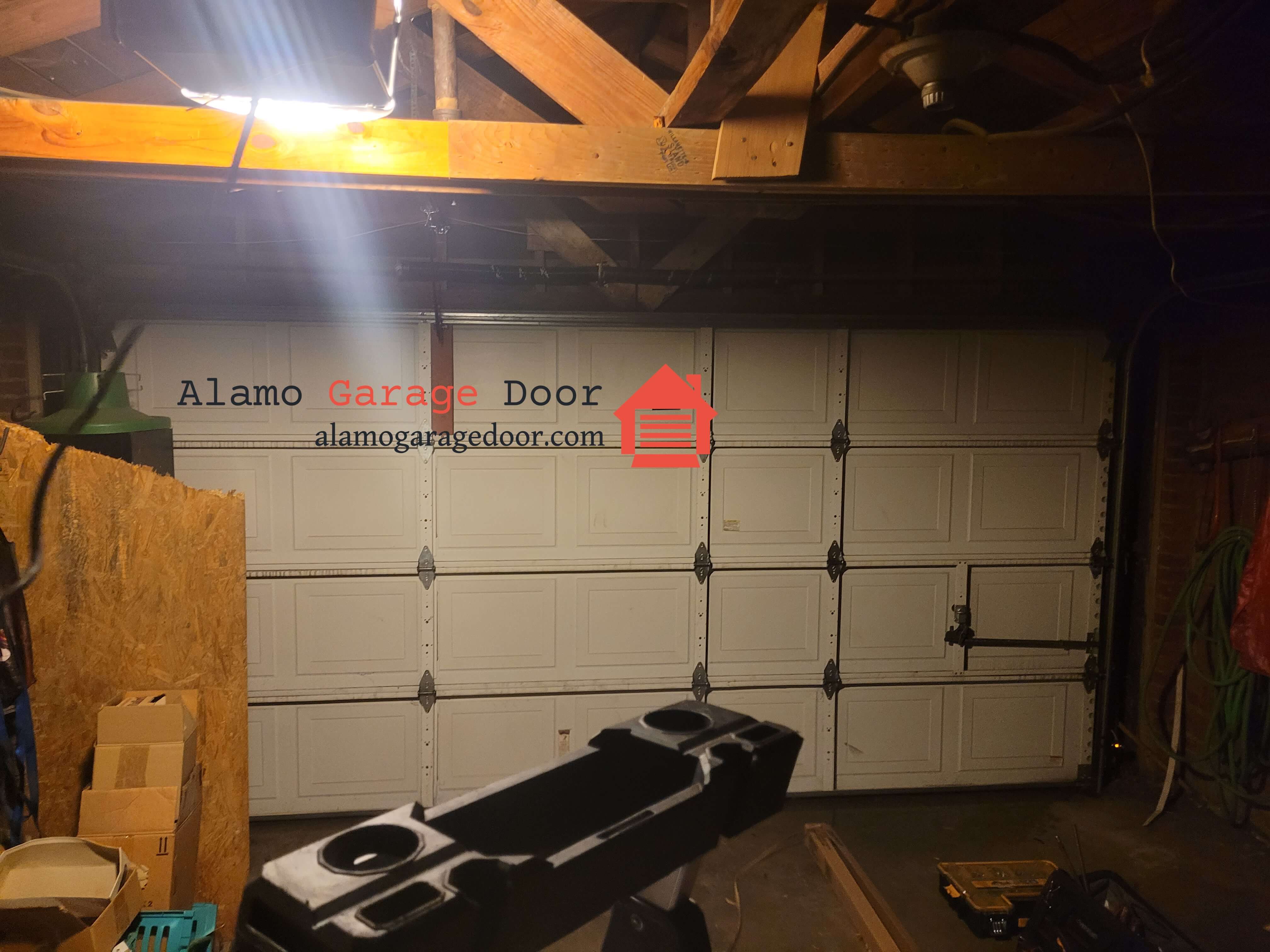 alamogaragedoor.com_torsion_spring_repair